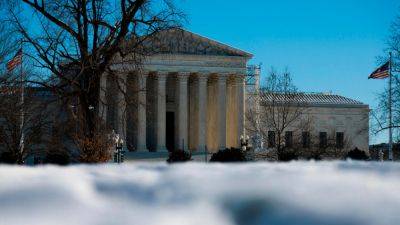 With key precedent on the line, Supreme Court debates reeling in government power