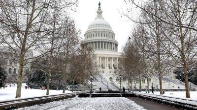 Biden signs stopgap measure to avoid partial government shutdown