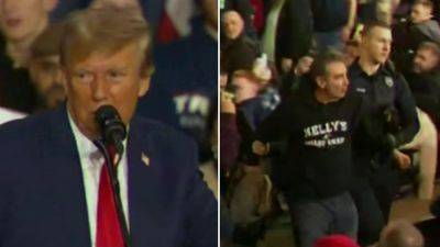 Joe Biden - Donald Trump - Nikki Haley - Ron Desantis - Nancy Pelosi - Mr Trump - Barack Obama - Michelle Del Rey - By Trump - Man shoved by Trump fans as ex-president calls for him to be ejected from rally - independent.co.uk - Usa - state Iowa - state New Hampshire - state Florida - city Manchester