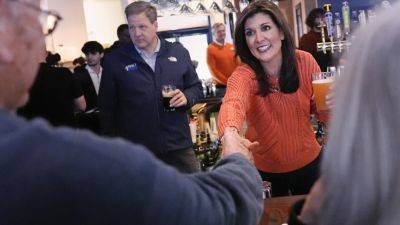 Joe Biden - Donald Trump - Nikki Haley - MICHELLE L PRICE - Haley - In New - Haley hopes to stop Trump’s march to nomination in New Hampshire: ‘America does not do coronations’ - apnews.com - state South Carolina - state Iowa - state New Hampshire - city Manchester - county Franklin