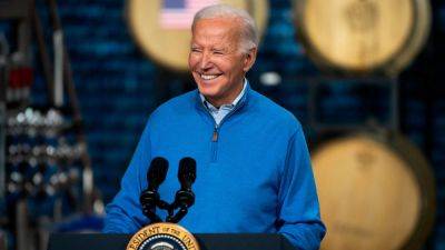 Biden credits Americans for strong economy, touts his legislative wins for 'turning the economy around'
