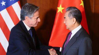 Antony Blinken - Wang Yi - China's Wang Yi tells Blinken US should lift sanctions on Chinese firms - cnbc.com - Usa - China - Washington - city Washington - city Sanction