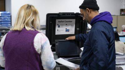 Election officials in the US face daunting challenges in 2024. And Congress isn’t coming to help - apnews.com - Usa - Washington - Ukraine - Britain - state Michigan - Russia