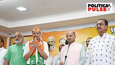 Sujit Bisoyi - Naveen Patnaik - Rajnath Singh - Manmohan Samal - In Odisha - In boost to BJP in Odisha, former Naveen aide joins party - indianexpress.com - India