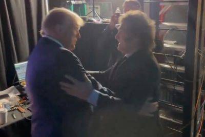 Trump greeted with fierce bear hug from Javier Milei backstage at CPAC