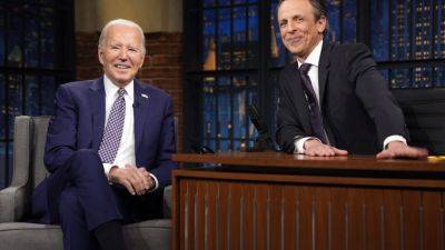 Biden interviewed by late-night comic Seth Meyers in New York