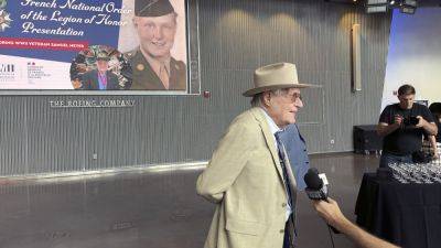 New Orleans hat seller honored by France for service in WWII - apnews.com - state New Hampshire - Britain - Belgium - France - Germany - city New Orleans