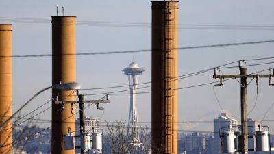 Effort to repeal Washington’s landmark carbon program puts budget in limbo with billions at stake - apnews.com - Washington - state Arizona - state Washington - city Seattle