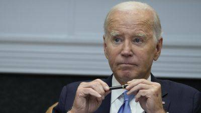 Justice Department will not charge Biden in classified documents probe