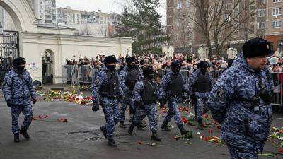 Navalny's funeral in pictures: Mourners gather in Moscow as riot police contain crowds