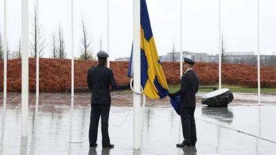 Murray Brewster - Jens Stoltenberg - Ulf Kristersson - Canadian - Sweden hoists its flag at NATO and will join Canadian brigade in Latvia - cbc.ca - Ukraine - Russia - Belgium - Norway - Turkey - city Brussels - Latvia - Sweden - Hungary - Finland