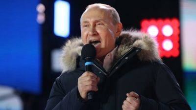 Vladimir Putin - Holly Ellyatt - Alexei Navalny - Russians vote in an election that Putin will win, but the Kremlin is looking for a landslide victory - cnbc.com - China - Russia