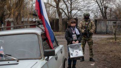 Ukraine war updates: Russia heads to the polls; pro-Ukraine groups continue border assault
