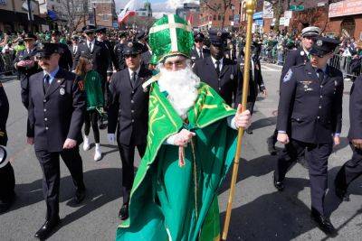 AP PHOTOS: Boston celebrates St. Patrick's Day; Biden holds White House brunch with Irish leader