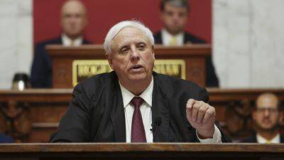 Bill - Jim Justice - West - Heavy-smoking West Virginia becomes the 12th state to ban lighting up in cars with kids present - apnews.com - state Ohio - state West Virginia - Charleston, state West Virginia