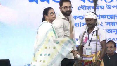 Mamata Banerjee plays drum, dances with tribals in East Medinipur | Watch video