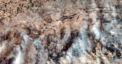 Phil Helsel - Satellite images show devastation of Texas wildfires - nbcnews.com - state Texas