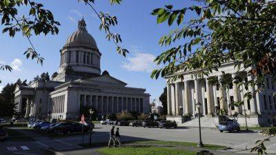 Washington state lawmakers approve police pursuit and income tax initiatives