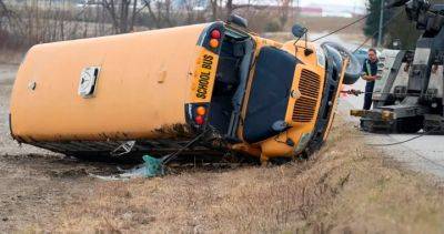 School bus driver charged after 5 children injured in rollover near Woodstock, Ont.