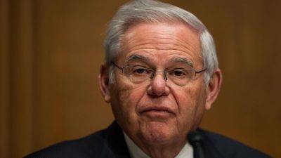 Bob Menendez - Nadine Menendez - Kara Scannell - Hit With - Sen. Bob Menendez hit with new conspiracy and obstruction of justice charges - edition.cnn.com - Qatar - Egypt - state New Jersey - New York