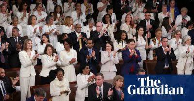 House Democratic women wear white for reproductive rights during Biden speech
