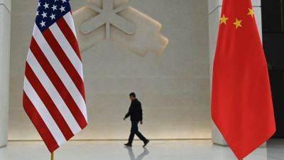 U.S. considers easing warnings for Americans traveling to China