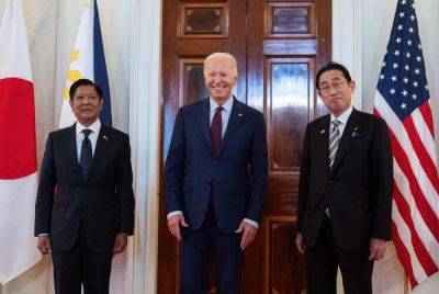 Biden vows to defend Philippines from attack in South China Sea
