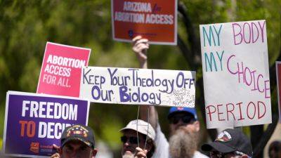 Bill - Geoff Mulvihill - Katie Hobbs - Action - US abortion battle rages on with moves to repeal Arizona ban and a Supreme Court case - apnews.com - Usa - state California - state Arizona - state Tennessee