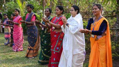 West Bengal CM Mamata Banerjee plays drums, dances with tribals in Jalpaiguri | Watch