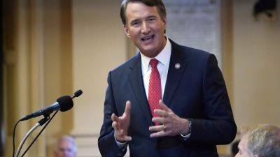 Gov. Youngkin signs a measure backed by abortion-rights groups but vetoes others