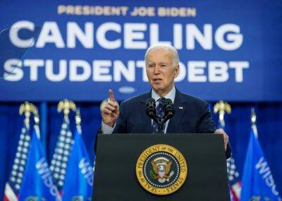 Joe Biden - Donald Trump - Andrew Feinberg - Biden Says - Action - Biden says he’s ‘not stopping’ student debt relief efforts as he unveils five new initiatives in Wisconsin - independent.co.uk - Usa - Madison, state Wisconsin - state Wisconsin