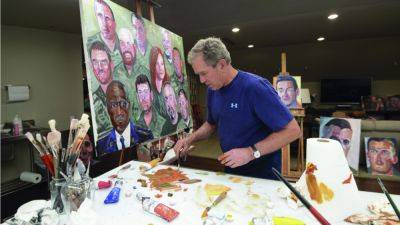 George W. Bush’s portraits of veterans are heading to Disney World - apnews.com - Usa - state Florida - county Lake