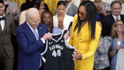 President Joe Biden cheers the Las Vegas Aces and women’s basketball