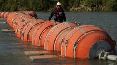 Joe Biden - Future of Texas’ migrant-blocking buoys may hinge on whether the Rio Grande is ‘navigable’ - apnews.com - Usa - state Texas - county Rio Grande - city New Orleans