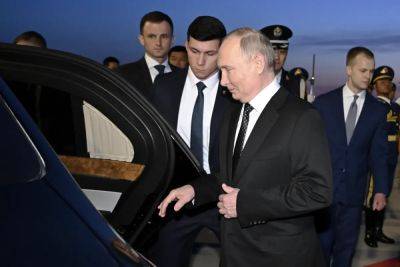 Vladimir Putin arrives in China to meet Xi Jinping as West watches with growing concern