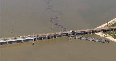 Graeme Demianyk - Barge Slams Into Bridge In Galveston, Texas, Causing Oil Spill - huffpost.com - state Texas - county Island