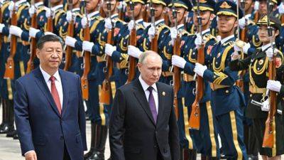 Xi Jinping - Vladimir Putin - Holly Ellyatt - Ukraine war live updates: Putin heaps praise on Xi while in China; Russia says forces advancing 'in all directions' in Ukraine - cnbc.com - China - city Beijing - Ukraine - Russia - region Kharkiv
