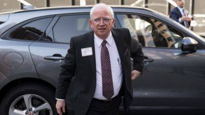 Former Trump lawyer John Eastman pleads not guilty in Arizona election case