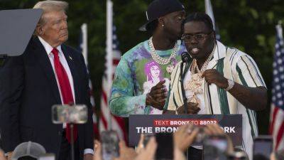 Joe Biden - Donald Trump - Trump appeared on stage at his Bronx rally with two rappers charged in a felony gang case - apnews.com - Usa - city New York - New York - county Bronx