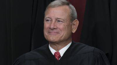Donald Trump - Dick Durbin - Sheldon Whitehouse - Roberts rejects Senate Democrats’ request to discuss Supreme Court ethics and Alito flag controversy - apnews.com - Washington - state New Jersey - state Virginia