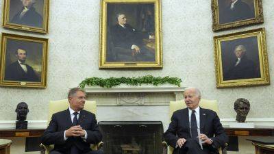 Joe Biden - Vladimir Putin - Karine Jean - Biden hosts Romanian leader at the White House to celebrate NATO partnership - apnews.com - Usa - Washington - Ukraine - Russia - Romania - Netherlands