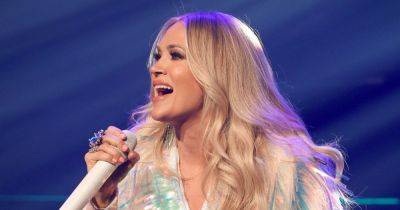 Carrie Underwood Takes A Tumble During Rainy Concert Performance