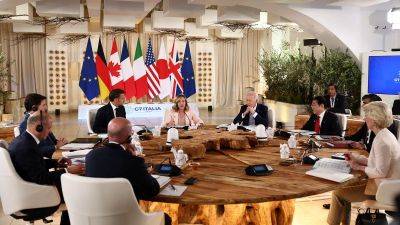 G7 leaders agree to loan Ukraine money backed by profits from frozen Russian investments as Biden pledges US support