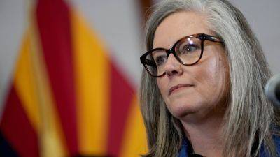 JONATHAN J COOPER - Bill - Katie Hobbs - JACQUES BILLEAUD - Arizona lawmakers pass budget closing $1.4 billion deficit - apnews.com - state Arizona