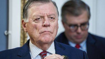 Self-funded political newcomer seeks to oust longtime Republican US Rep. Tom Cole in Oklahoma