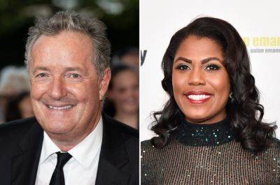 Piers Morgan claims Celebrity Apprentice co-star Omarosa wanted to sleep with him for a ‘showmance’