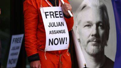Carrie Johnson - Julian Assange - WikiLeaks founder Julian Assange strikes plea deal with the U.S. - npr.org - Usa - Iraq - Afghanistan - Britain - state Virginia - Australia - county Pacific - Northern Mariana Islands
