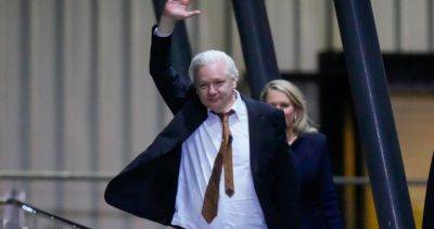 Julian Assange - Julian Assange returns to Australia after being freed in plea deal - globalnews.ca - Usa - Iraq - Afghanistan - Britain - Australia - county Smith - city Baghdad - county Pacific - Northern Mariana Islands
