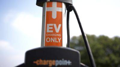 Many Americans still shying away from EVs despite Biden push, AP-NORC/EPIC poll finds