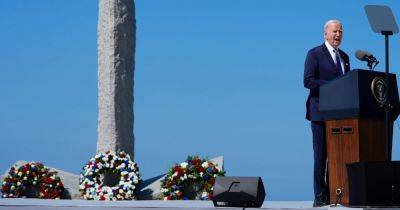 Biden makes the case to fight extremists by invoking war waged on D-Day